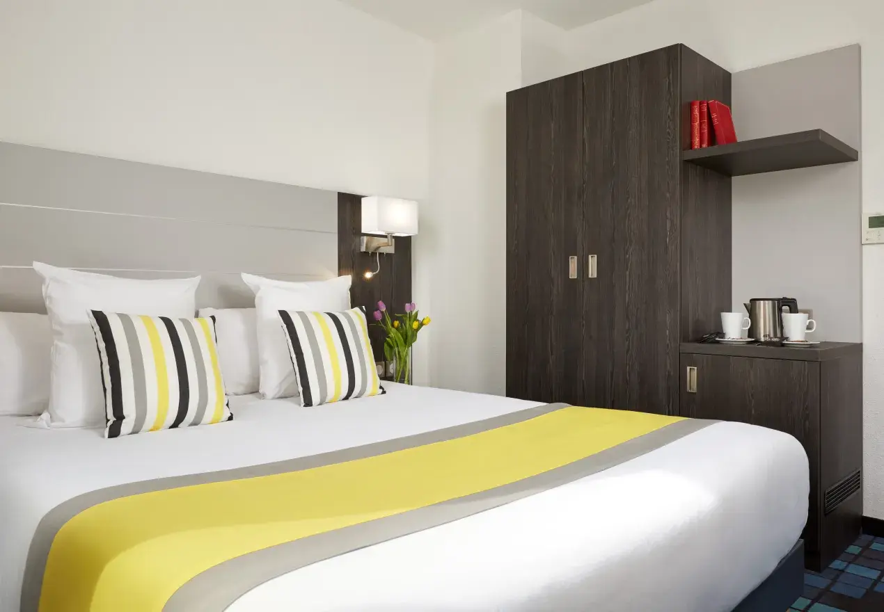  Hotel Astrid Lourdes Quarto Duplo Deluxe do Hotel Astrid Lourdes, a poucos passos da Gruta